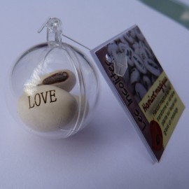 Boule transparente et ses 3 graines de haricots magiques blanc